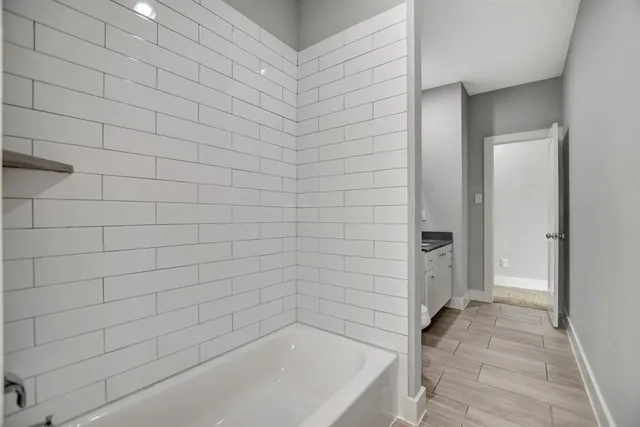 a bathroom with a bathtub