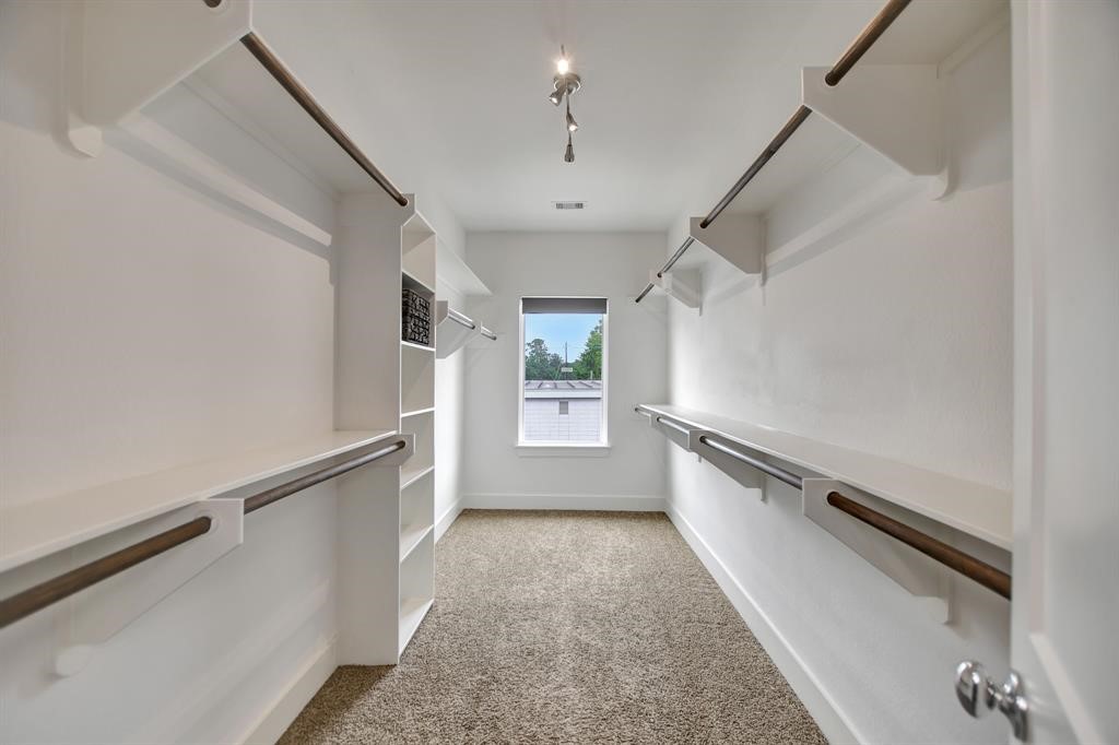 20 Evanston Street Houston, TX 77015 - Photo 23 of 31 a view of a hallway with a white walls