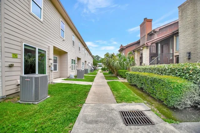 a view of a house with garden