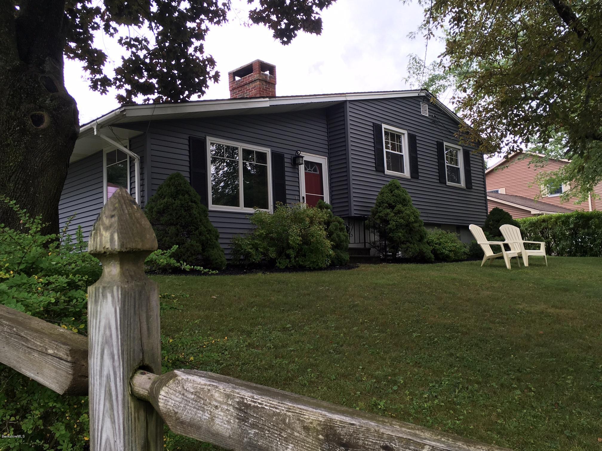 17 Spring Road Adams, MA 01220 - Photo 2 of 37 a front view of a house with a yard