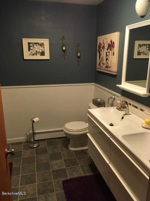 17 Spring Road Adams, MA 01220 - Photo 13 of 37 a bathroom with a toilet sink and mirror