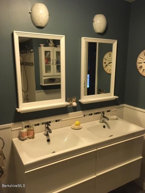 17 Spring Road Adams, MA 01220 - Photo 15 of 37 a bathroom with a sink and a mirror
