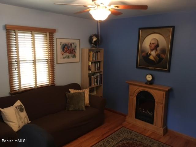 17 Spring Road Adams, MA 01220 - Photo 16 of 37 a living room with furniture and a fireplace