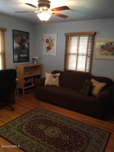 17 Spring Road Adams, MA 01220 - Photo 17 of 37 a living room with furniture and a rug