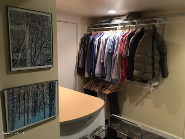 17 Spring Road Adams, MA 01220 - Photo 20 of 37 a view of walk in closet with clothes and shoes