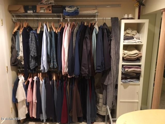17 Spring Road Adams, MA 01220 - Photo 22 of 37 a view of walk in closet with clothes and shoes