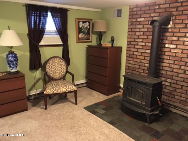 17 Spring Road Adams, MA 01220 - Photo 25 of 37 a living room with furniture and a window