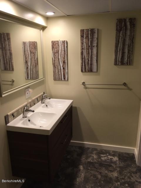 17 Spring Road Adams, MA 01220 - Photo 30 of 37 a bathroom with a sink and a mirror