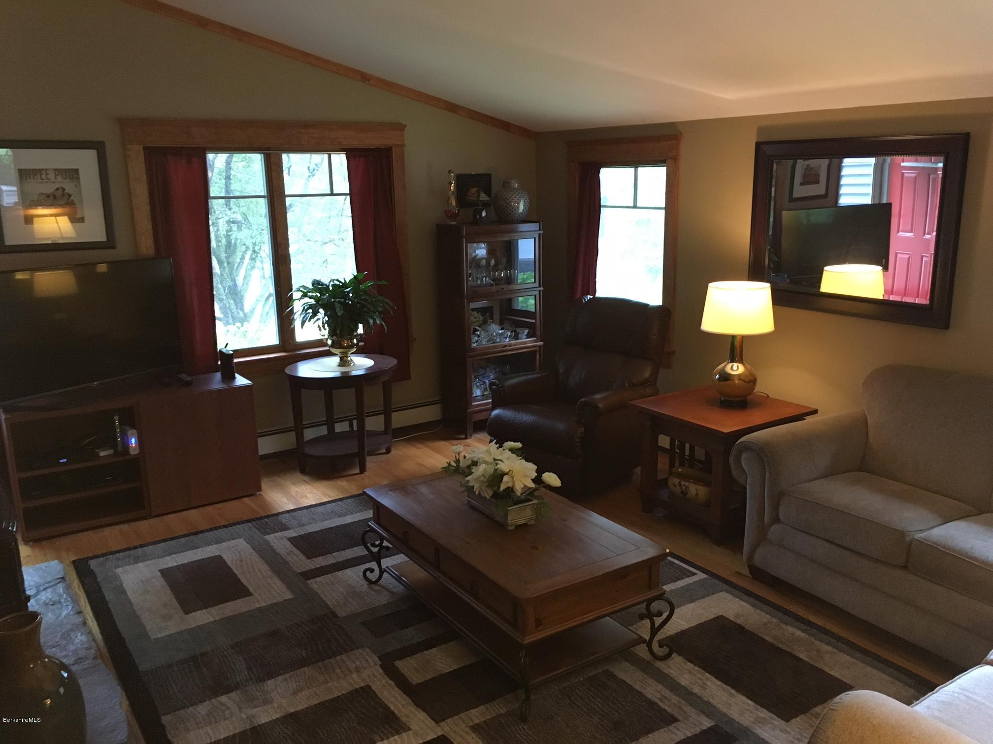 17 Spring Road Adams, MA 01220 - Photo 7 of 37 a living room with furniture and wooden floor