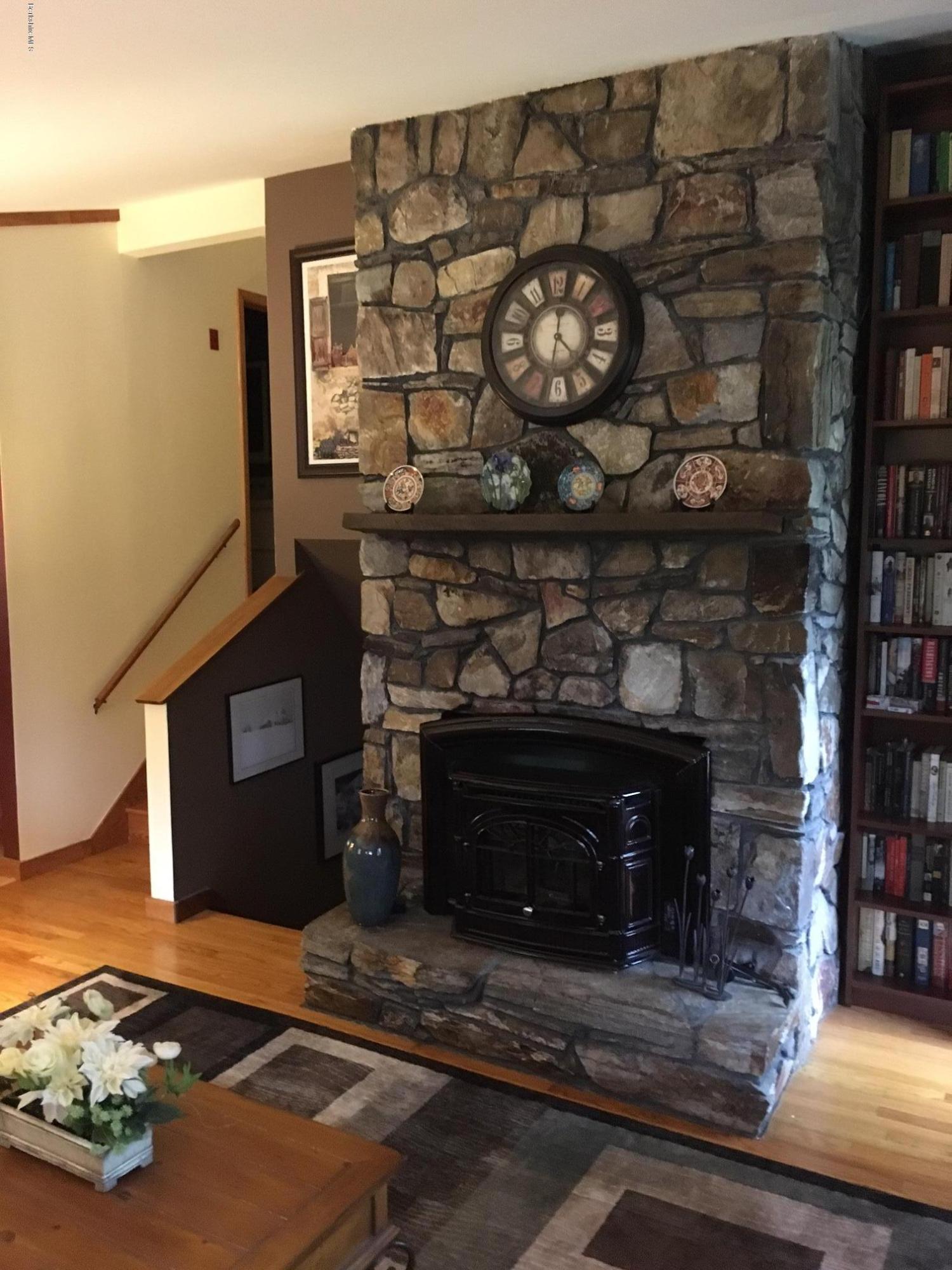 17 Spring Road Adams, MA 01220 - Photo 9 of 37 a living room with furniture and a fireplace