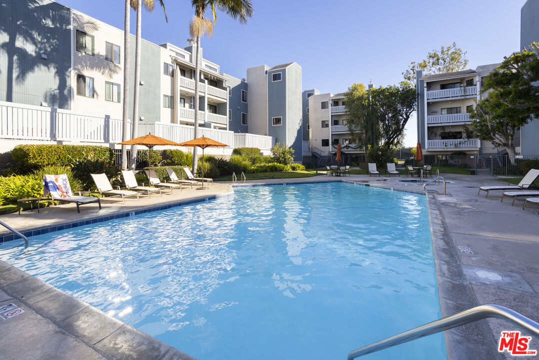 8176 Manitoba Street, Unit 4 Playa del Rey, CA 90293 - Photo 18 of 24 a view of a lake with a building