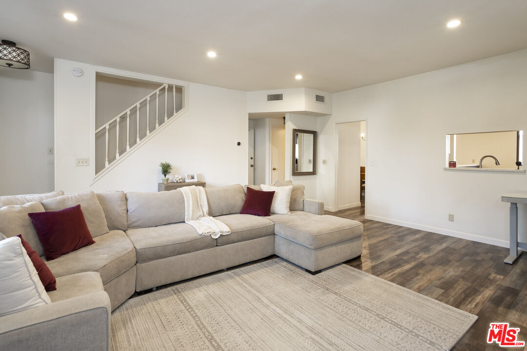 8176 Manitoba Street, Unit 4 Playa del Rey, CA 90293 - Photo 6 of 24 a living room with furniture and a couch