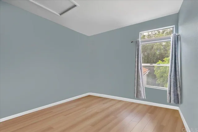 a view of a road with a building in the background