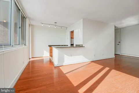 a view of a kitchen with a sink and dishwasher