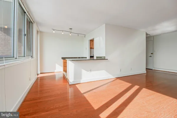 a view of a kitchen with a sink and dishwasher