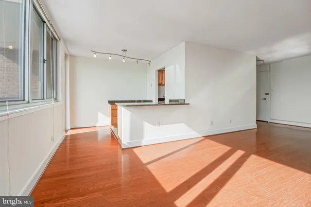 a view of a kitchen with a sink and dishwasher