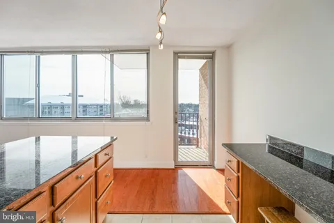 a kitchen with a large window