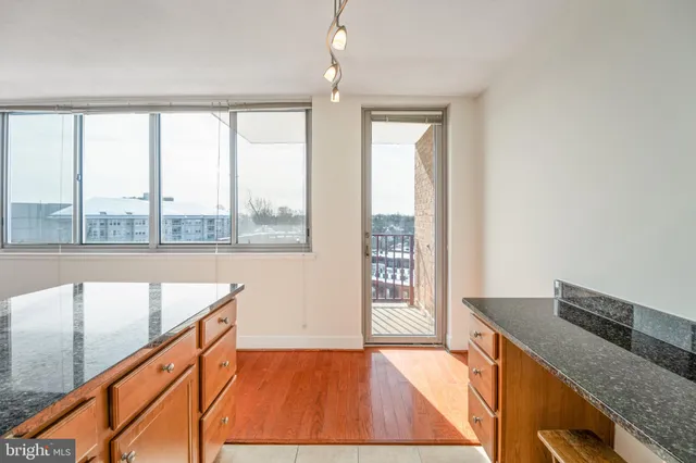 a kitchen with a large window