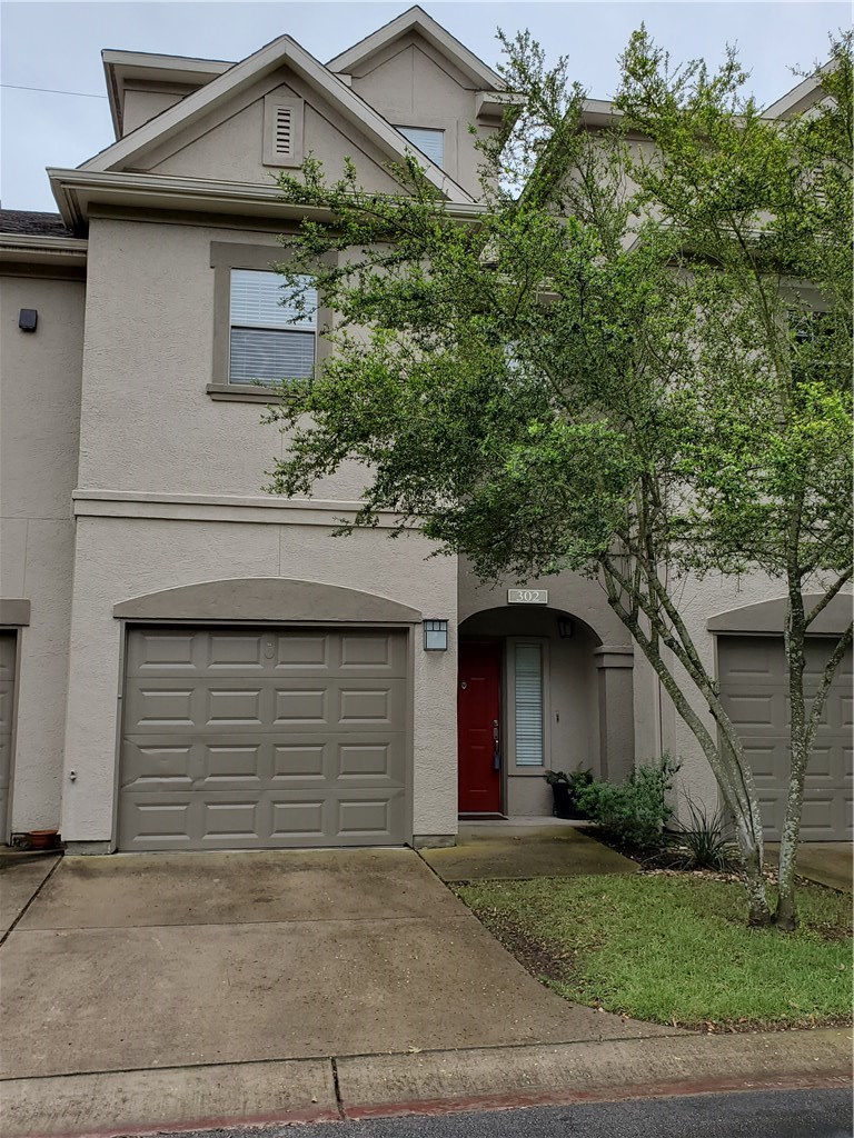 11203 Ranch Road 2222, Unit 302 Austin, TX 78732 - Photo 1 of 18 3 Story Townhome style Condo with attached garage in the gated Alicante Townhomes community