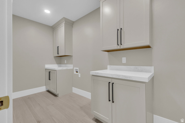 2828 Jojo Road Eagle Mountain, UT 84005 - Photo 44 of 63 Light wood-finish flooring complements the neutral wall color
