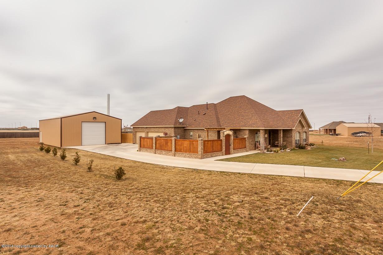 18500 Grasslands Road Bushland, TX 79124 - Photo 3 of 33 South side with fenced in patio