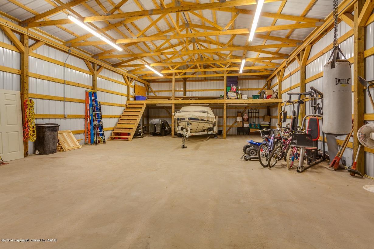 18500 Grasslands Road Bushland, TX 79124 - Photo 31 of 33 Barn interior 12ft overhead door