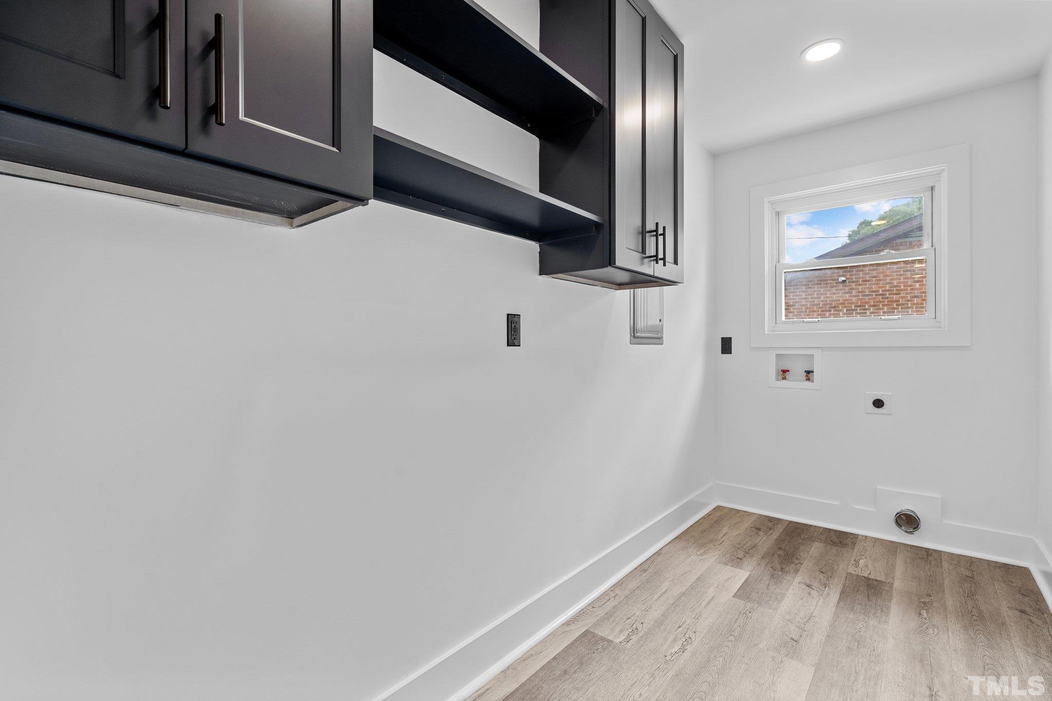 1102 Jerome Road Durham, NC 27713 - Photo 17 of 41 a view of empty room with wooden floor