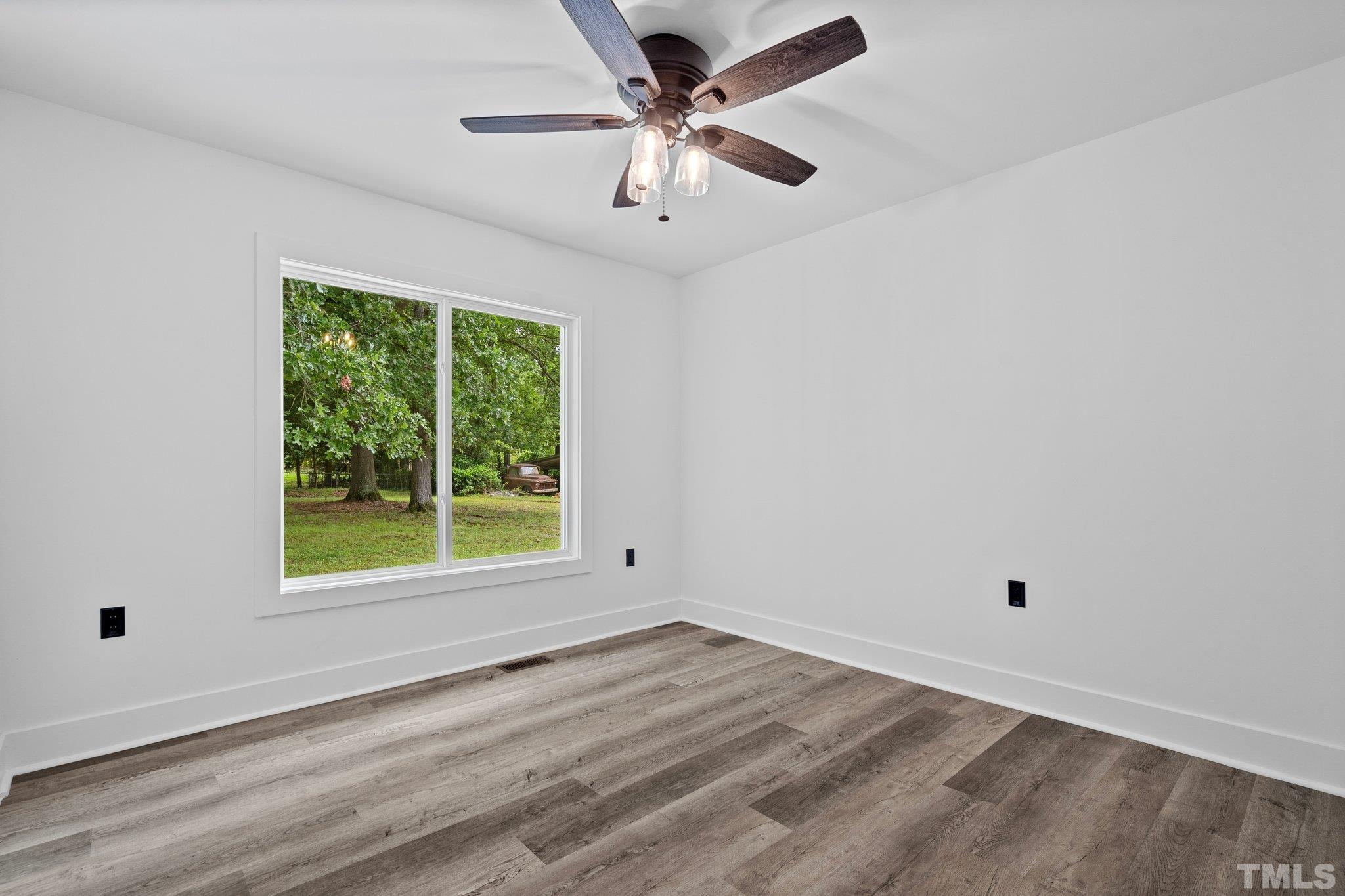 1102 Jerome Road Durham, NC 27713 - Photo 20 of 41 a view of an empty room with a window
