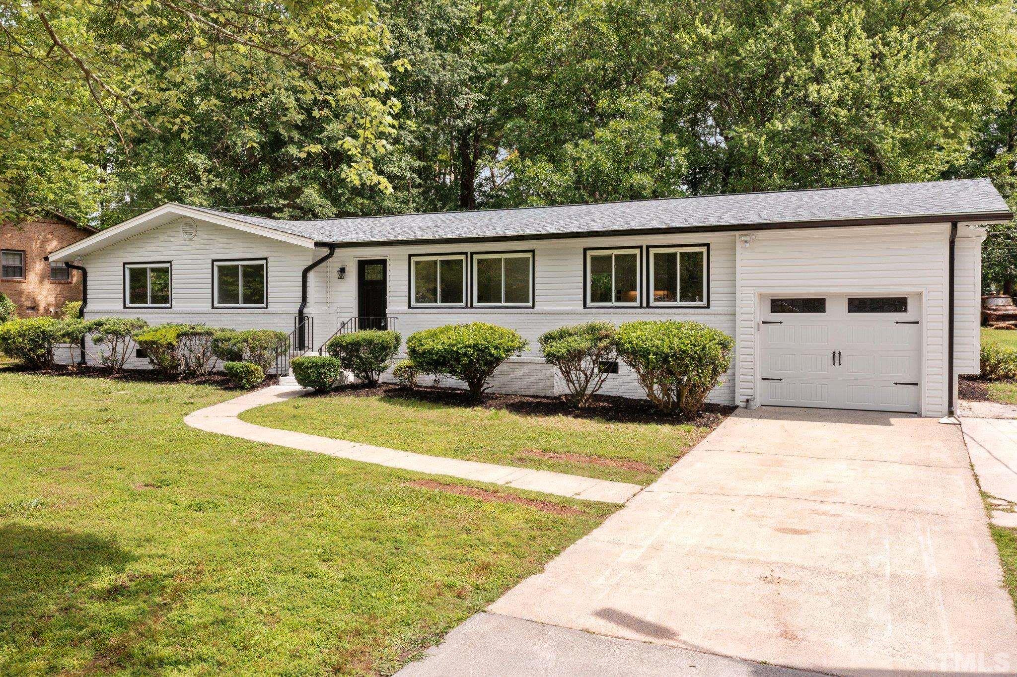 1102 Jerome Road Durham, NC 27713 - Photo 3 of 41 a view of a house with pool