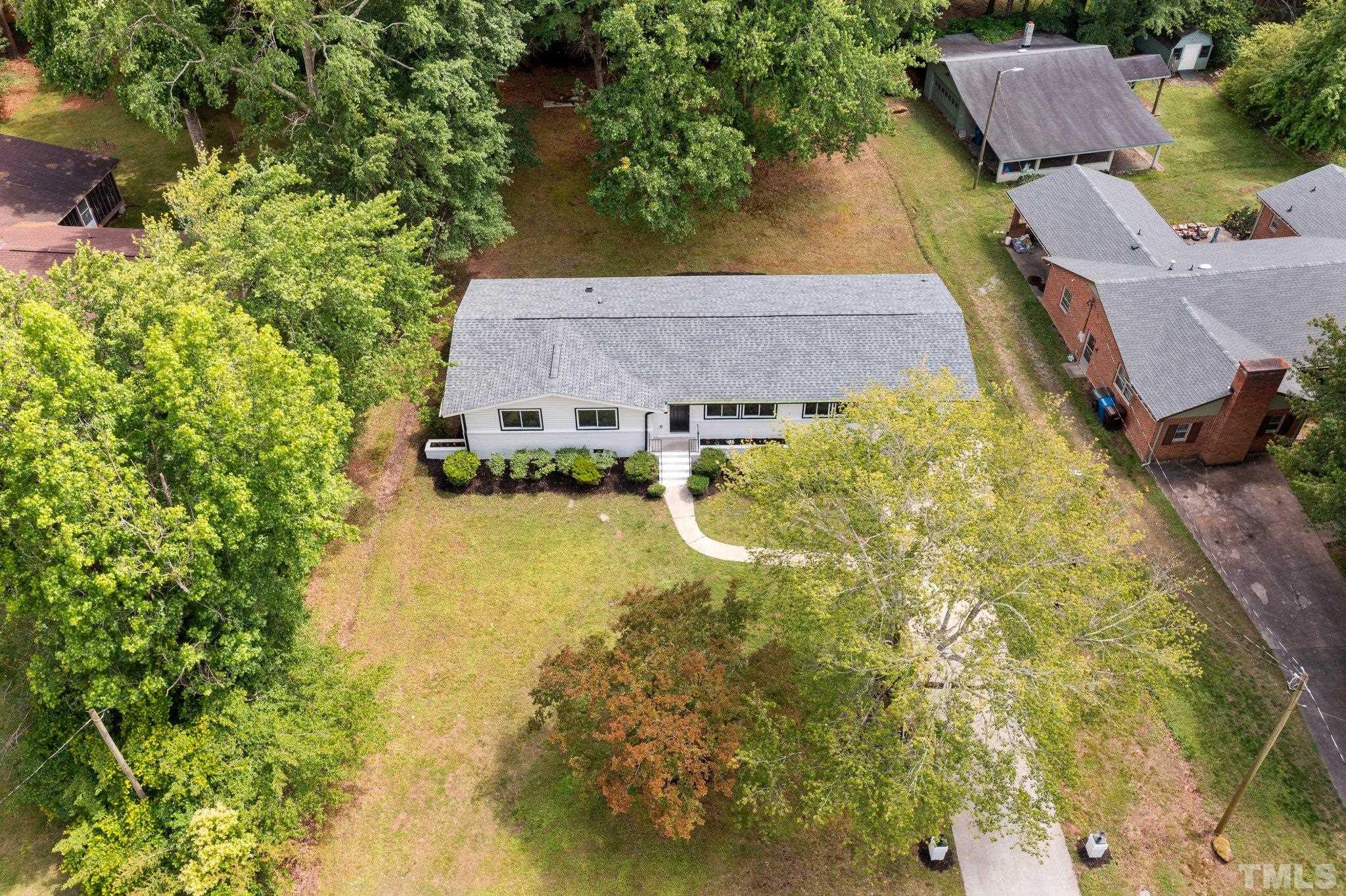 1102 Jerome Road Durham, NC 27713 - Photo 33 of 41 an aerial view of house with yard swimming pool and outdoor seating