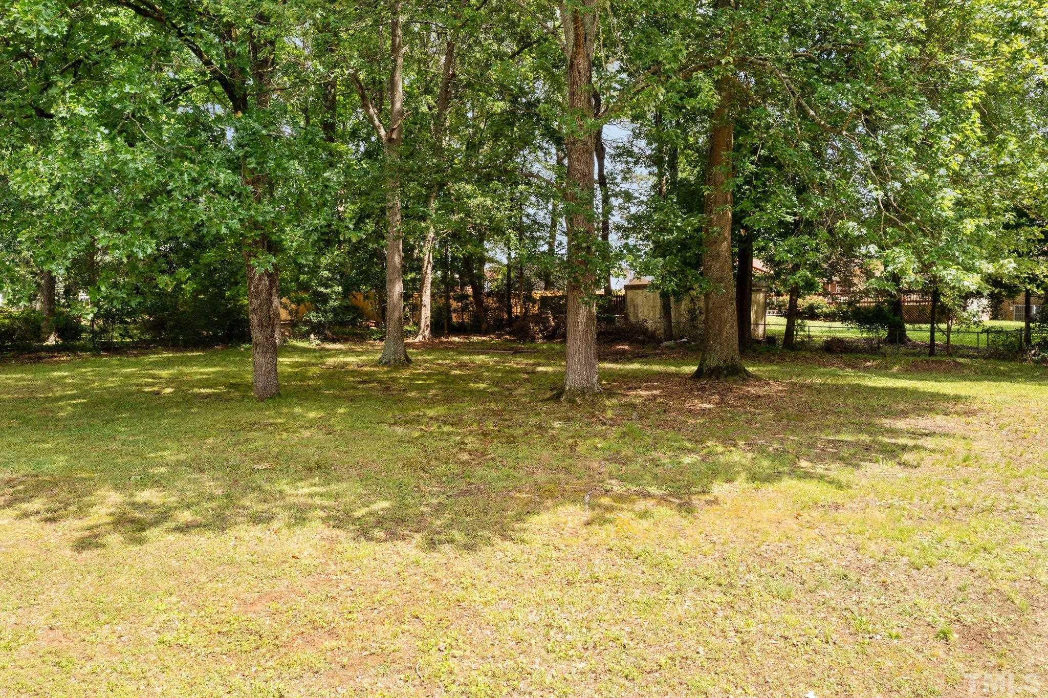 1102 Jerome Road Durham, NC 27713 - Photo 37 of 41 a swimming pool with trees in the background