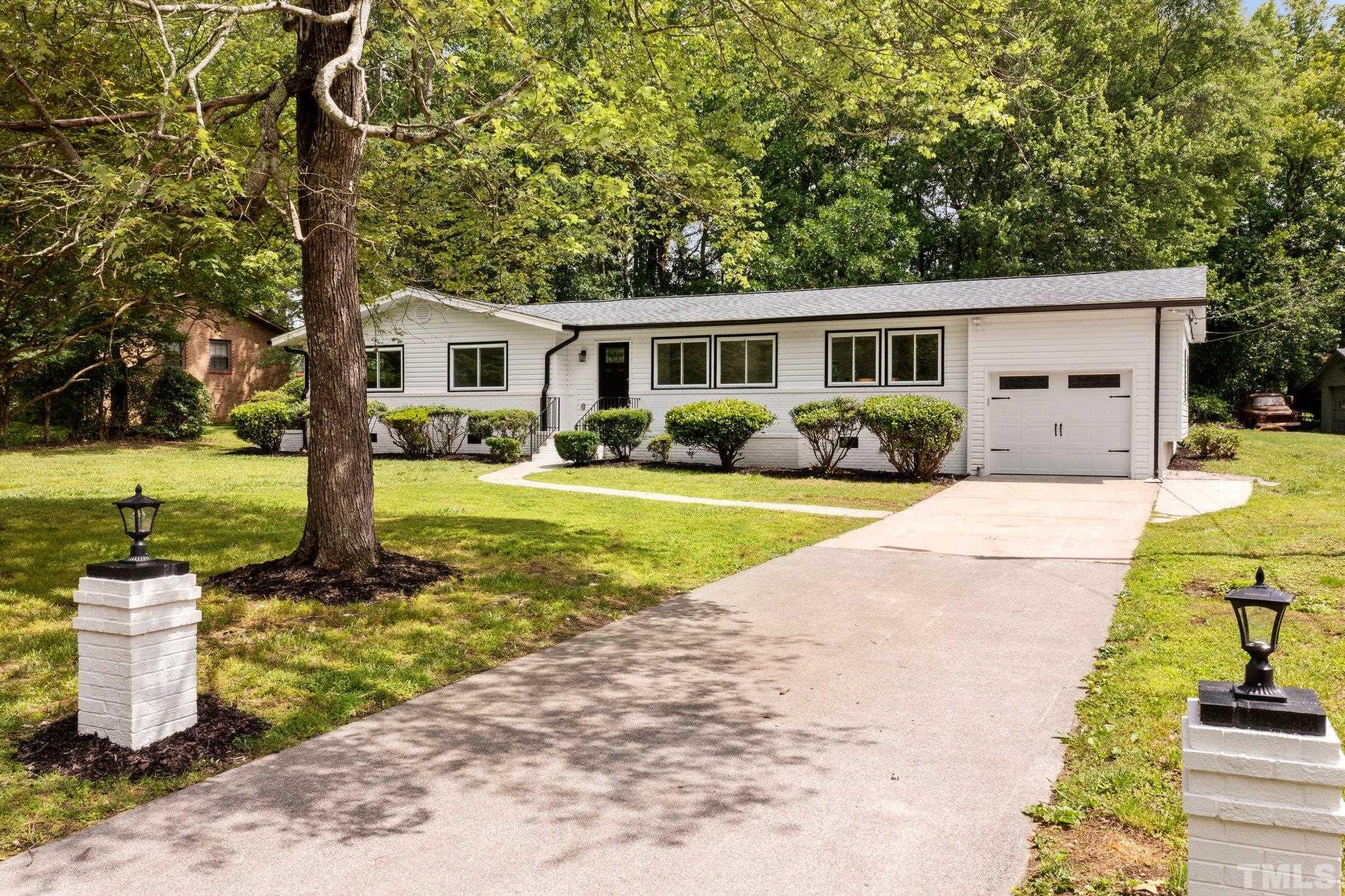 1102 Jerome Road Durham, NC 27713 - Photo 40 of 41 a view of a house with backyard and sitting area
