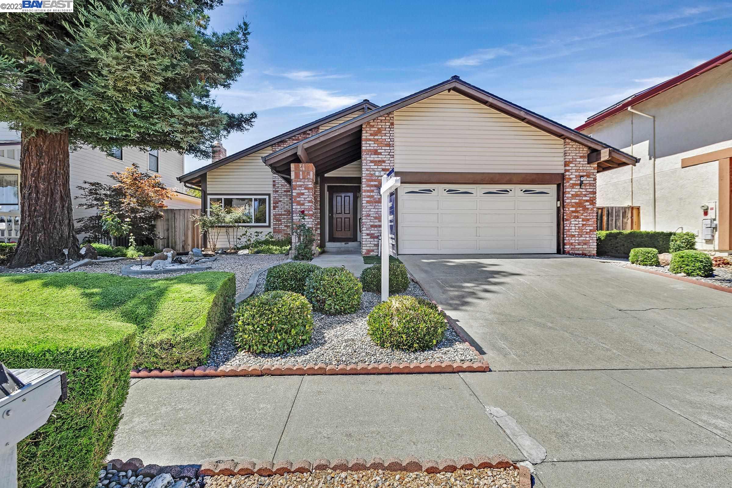 72 Zacate Place Fremont, CA 94539 - Photo 1 of 1 a front view of a house with garden