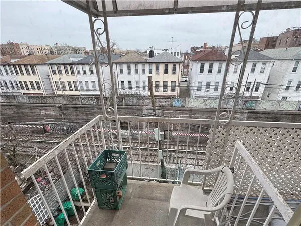 a view of balcony with furniture