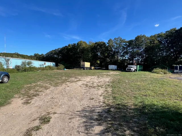 a view of swimming pool with lake view and mountain view
