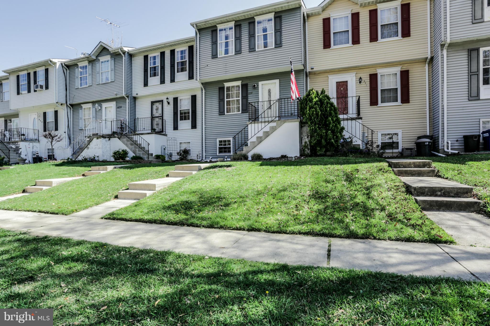 639 Nollmeyer Road Baltimore, MD 21220 - Photo 2 of 28 a front view of a house with a yard