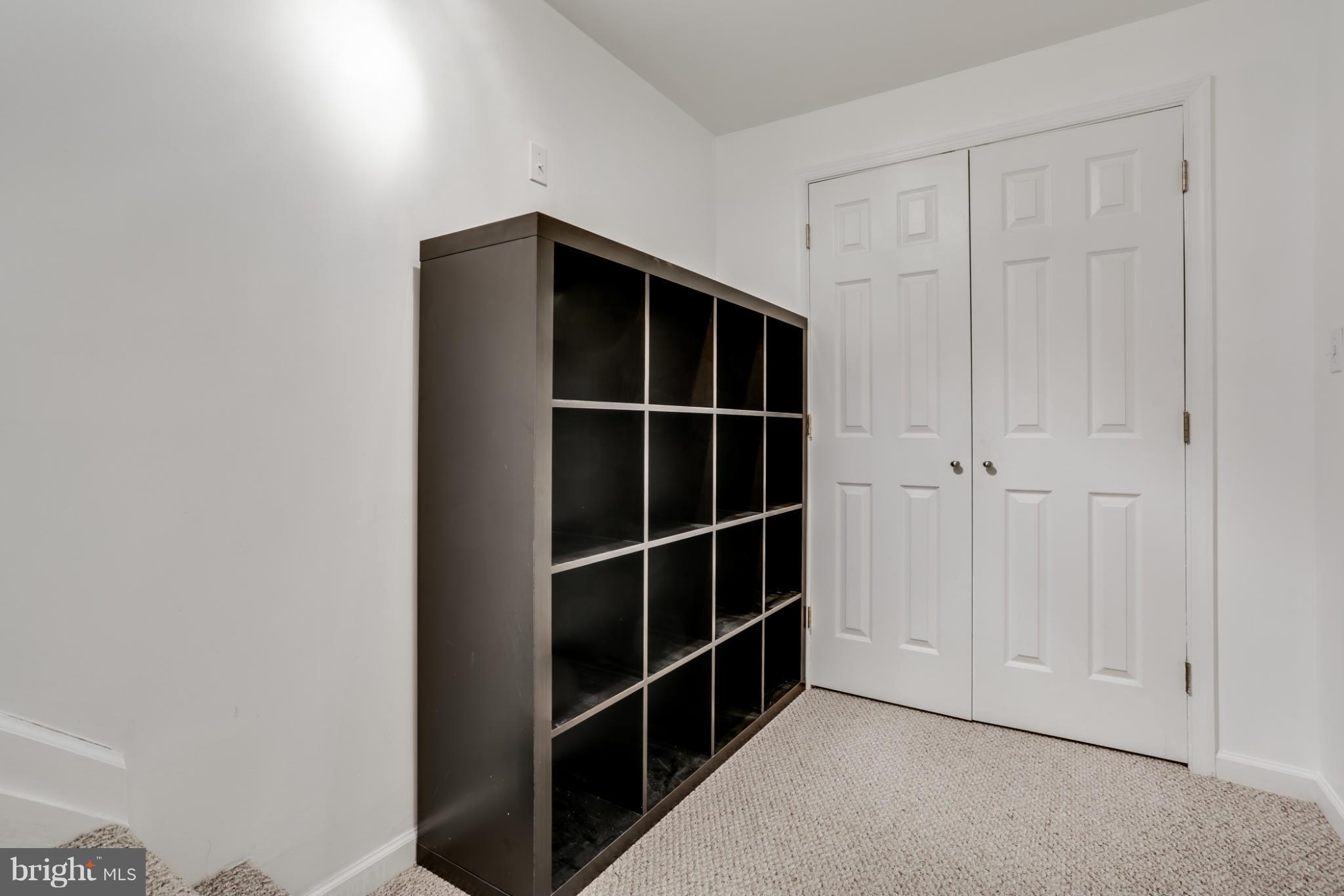 639 Nollmeyer Road Baltimore, MD 21220 - Photo 11 of 28 a view of an empty room with empty shelves