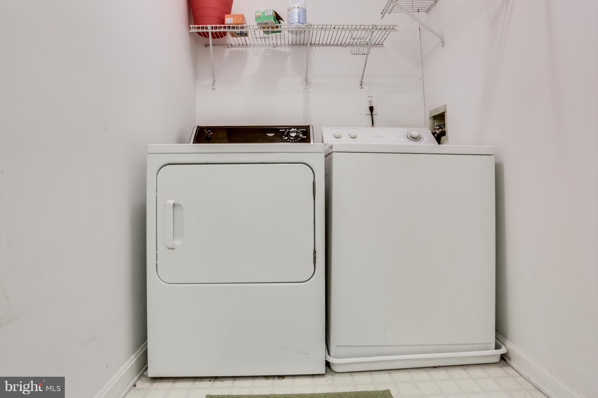 639 Nollmeyer Road Baltimore, MD 21220 - Photo 22 of 28 a utility room with dryer and washer