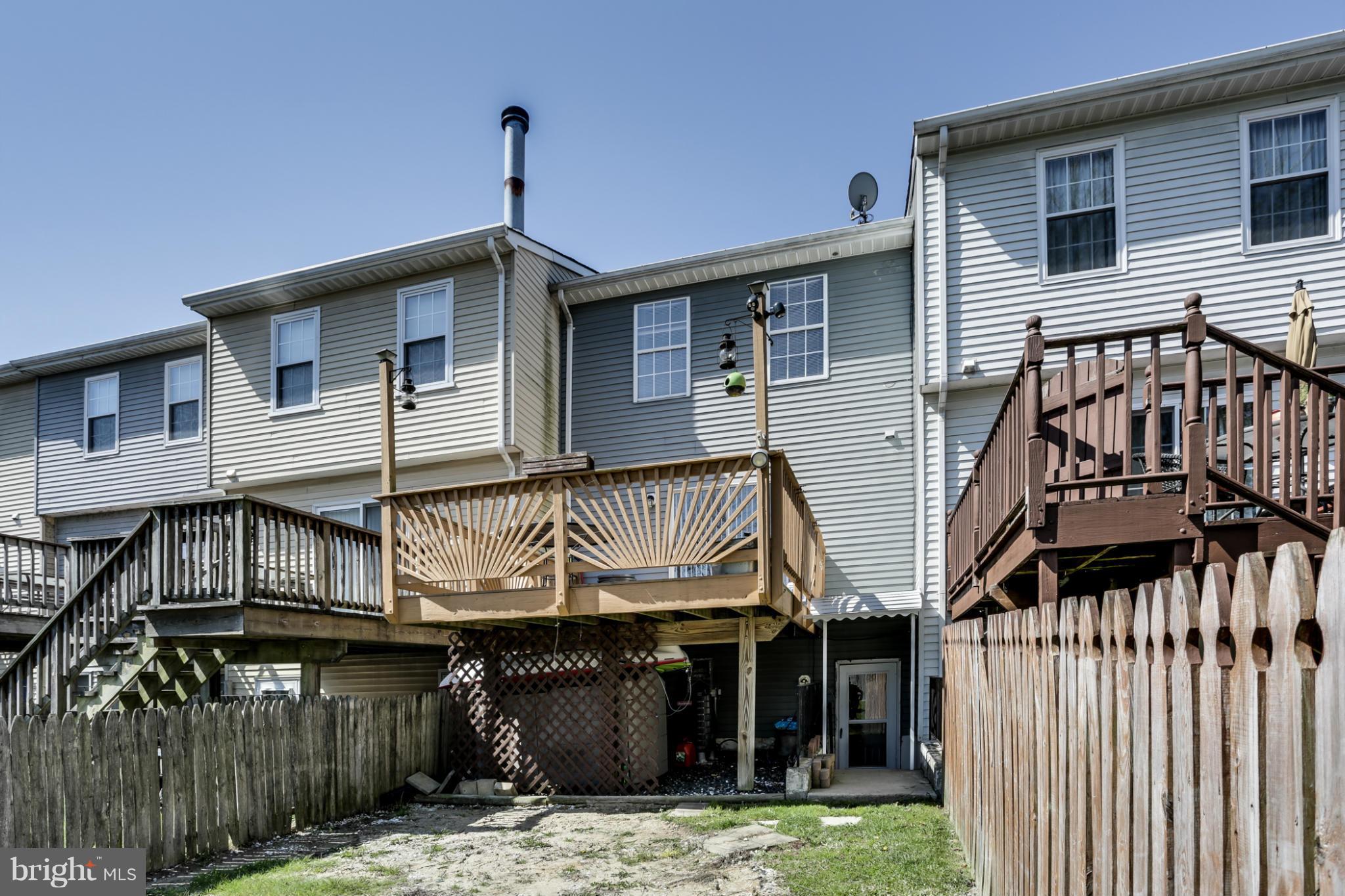 639 Nollmeyer Road Baltimore, MD 21220 - Photo 27 of 28 a front view of a house with a yard