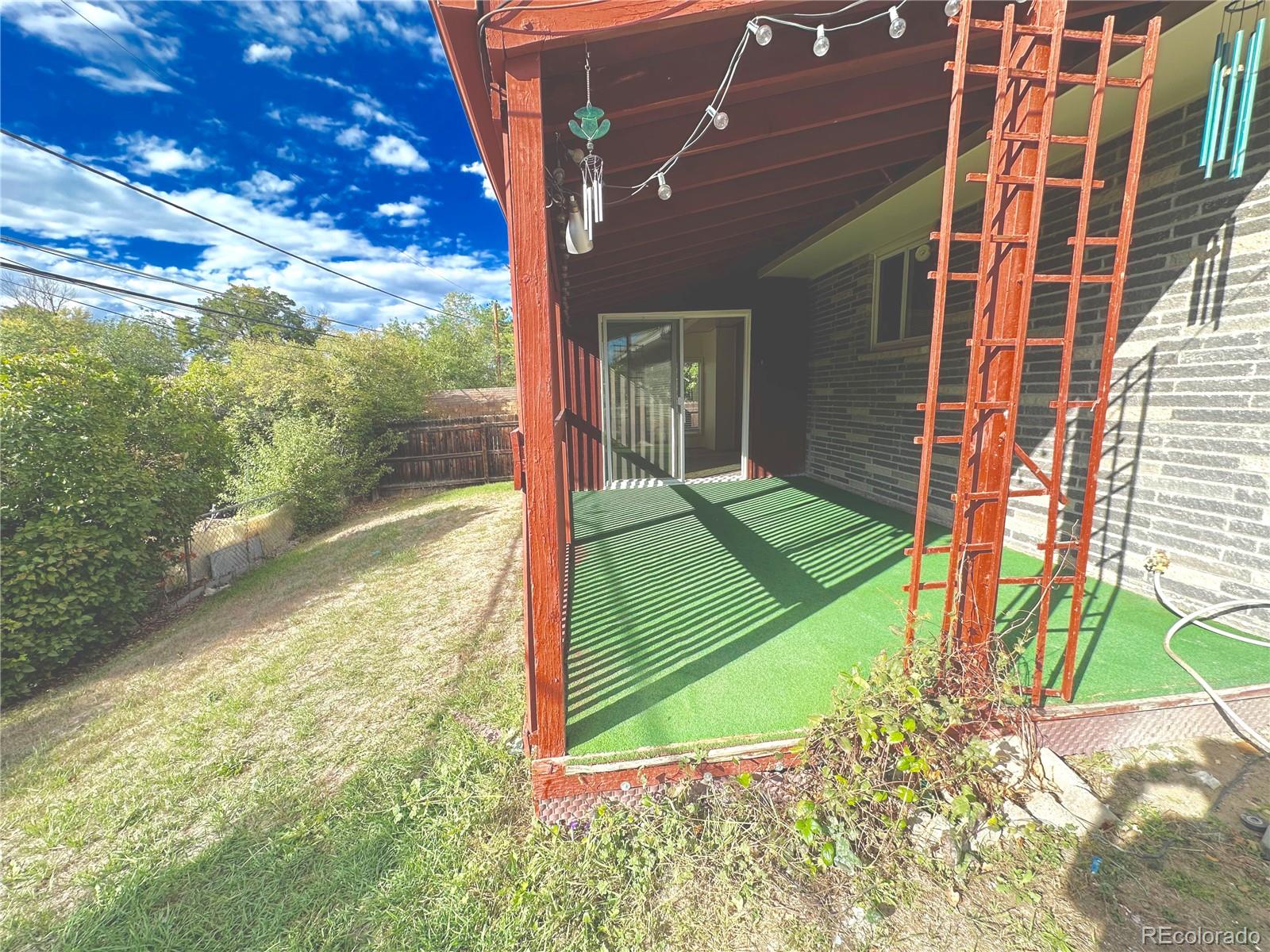 423 Empire Street Aurora, CO 80010 - Photo 15 of 44 a view of a backyard
