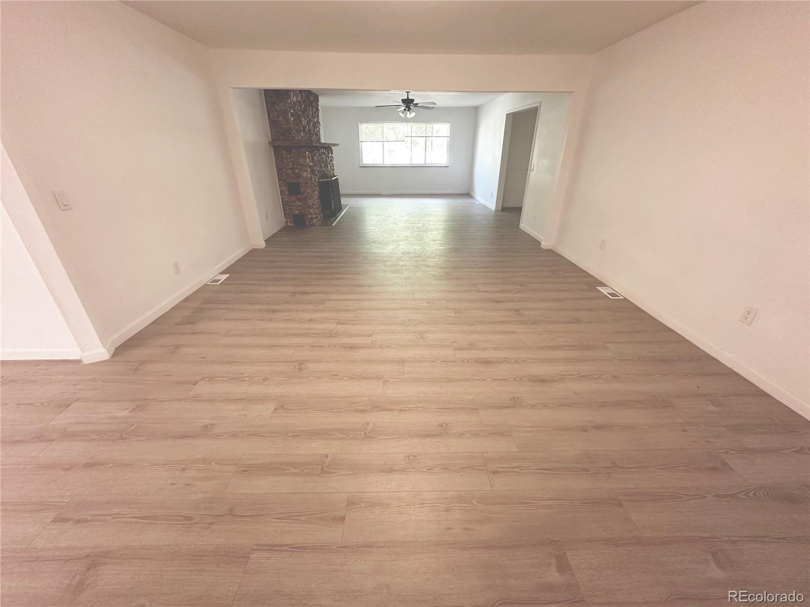 423 Empire Street Aurora, CO 80010 - Photo 19 of 44 a view of an empty room and window