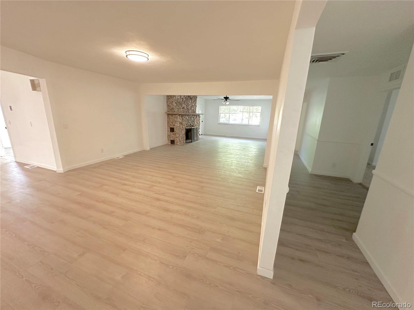 423 Empire Street Aurora, CO 80010 - Photo 22 of 44 a view of livingroom with wooden floor