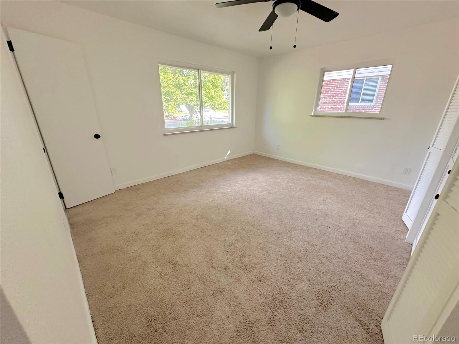 423 Empire Street Aurora, CO 80010 - Photo 33 of 44 an empty room with windows