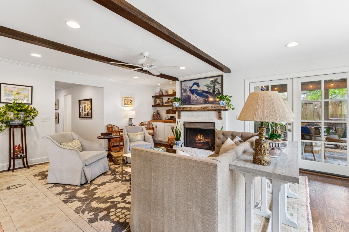 210 Cherokee Road Nashville, TN 37205 - Photo 19 of 56 a living room with furniture a fireplace and a table