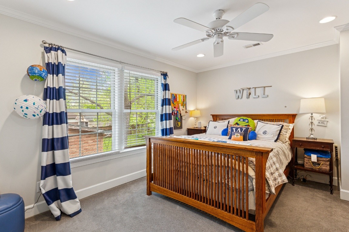 210 Cherokee Road Nashville, TN 37205 - Photo 28 of 56 a bedroom with furniture and a window