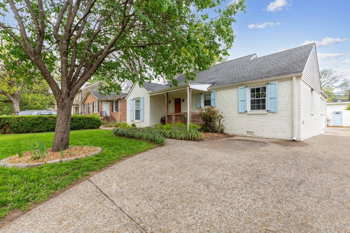 210 Cherokee Road Nashville, TN 37205 - Photo 3 of 56 a front view of house with yard and green space