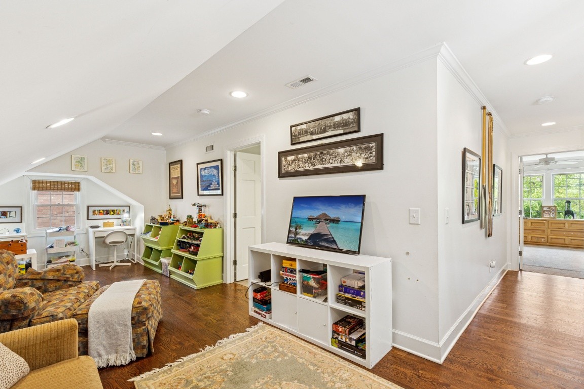 210 Cherokee Road Nashville, TN 37205 - Photo 35 of 56 a living room with furniture and a flat screen tv