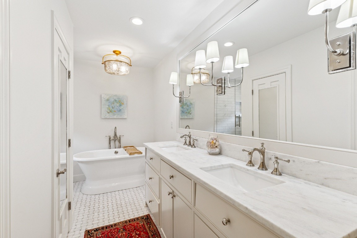 210 Cherokee Road Nashville, TN 37205 - Photo 44 of 56 a bathroom with a sink and a mirror