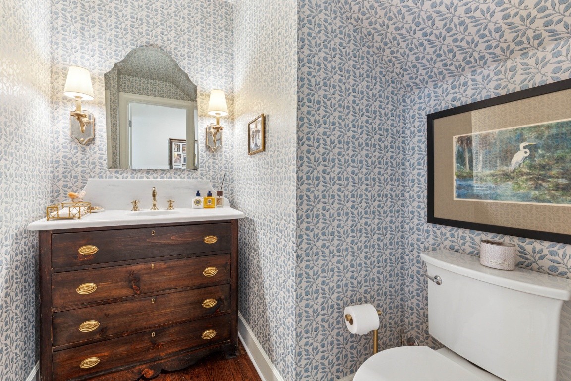 210 Cherokee Road Nashville, TN 37205 - Photo 46 of 56 a bathroom with a toilet a sink and mirror
