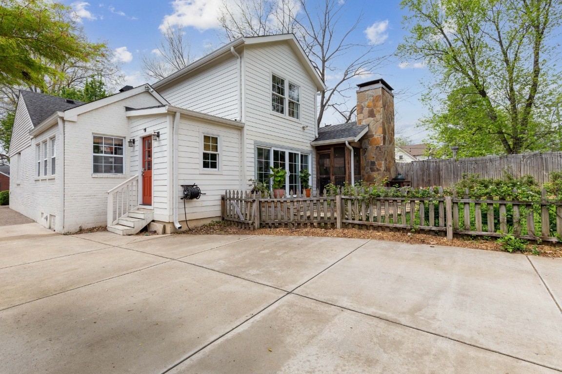 210 Cherokee Road Nashville, TN 37205 - Photo 53 of 56 a view of a house with wooden fence